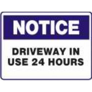 A rectangular Signs of Safety Notice driveway in use 24 hours sign with a blue border and the word "notice" at the top in white on a blue background. Below, it reads "driveway in use 24 hours" in black.