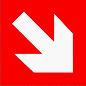 A bold white Signs of Safety emergency directional arrow pointing down to the bottom left on a bright red square background.