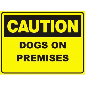 A yellow CA50 Signs of Safety Caution Dogs on premises sign with bold black text reading 